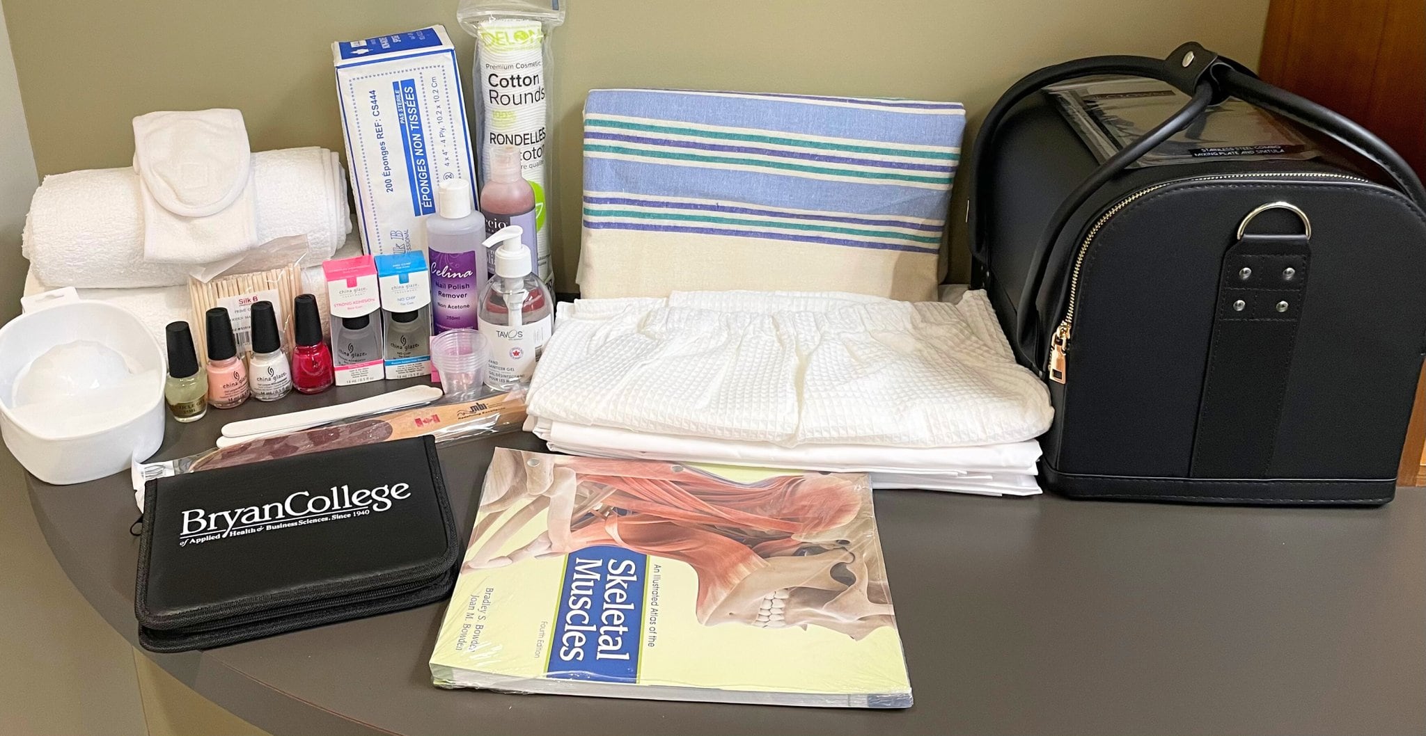 photo of amst student kit containing various nail and beauty items