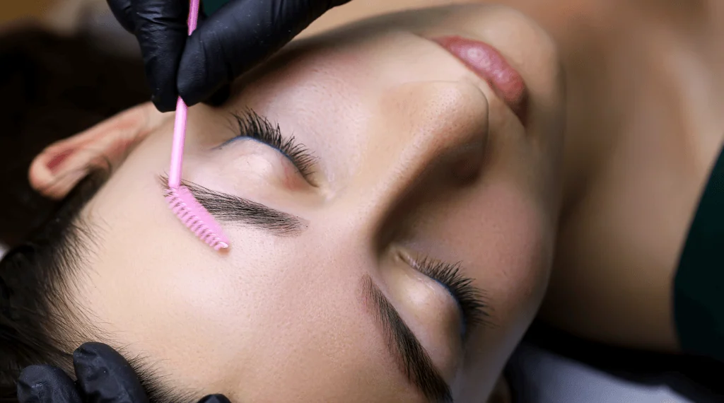 image of a woman getting a brow lamination treatment at a salon